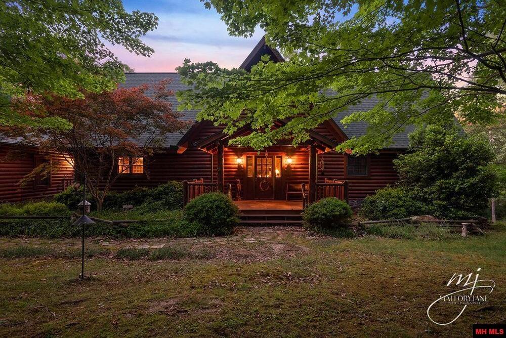 three level log home