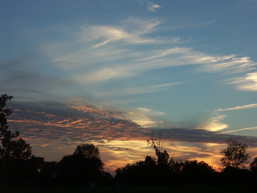 Colorful clouds with an early sunrise