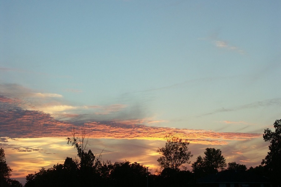 Pastel-colored clouds at sunrise
